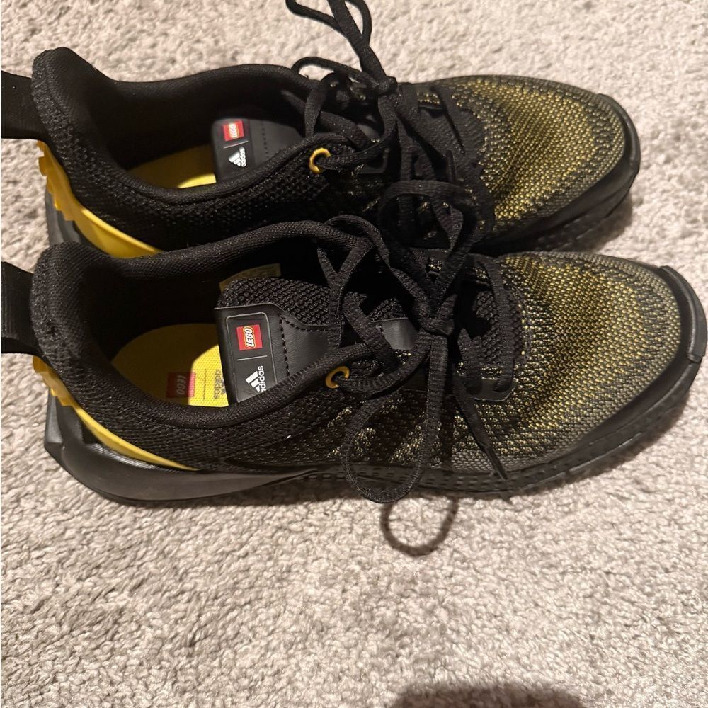 LEGOS ADITION Adidas Black and Yellow Tennis Shoes